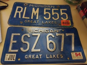 Michigan License Plates set of 2 USED blue with slight discoloration 1994 & 2007 - Picture 1 of 2