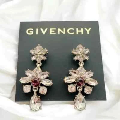 Pendientes colgantes de flores de cristal mezclado tono dorado Givenchy. Foto 1 de 4