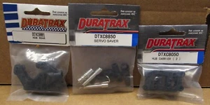 Duratrax Maximum BX / ST Aluminum Wheel Hub DTXC9950 & Servo Saver DTXC8850 LOT - Picture 1 of 2