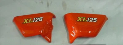FUNDA LATERAL IZQUIERDA Y DERECHA HONDA CT125 XL100 XL125 NARANJA nueva Foto 1 de 3