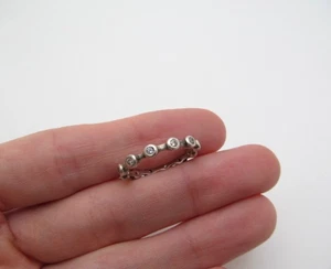 Silpada 925 Sterling Silver Bezel Clear Round 3mm Stone Station Band Ring Sz 7.5 - Picture 1 of 7