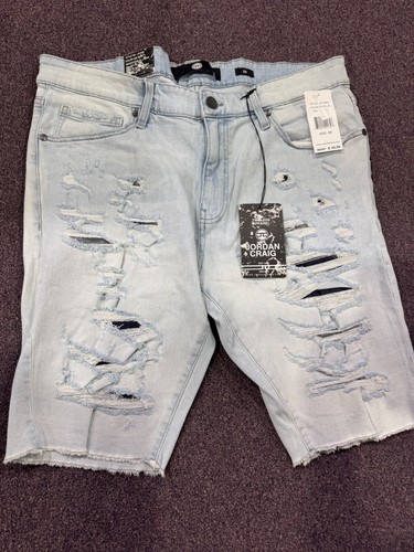 Pantaloncini Jordan Craig blu ghiaccio strappo e riparazione