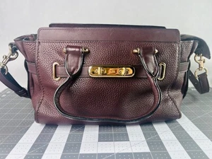 Borsa a mano Coach Pebble Leather Swagger 27 tracolla sangue di bue - Foto 1 di 11