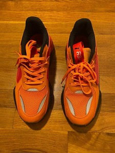 orange puma shoes