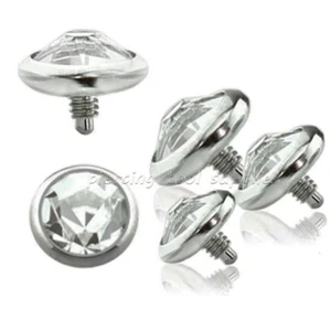 Ancoraggio dermico zirconi piatti tregati internamente acciaio chirurgico 14G parte superiore 3mm-5mm zirconi - Foto 1 di 2