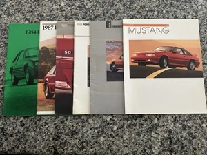 HUGE lot of Ford Mustang sales brochures, 1984, 1987, 1989, 1990, 1991, 1993 - Picture 1 of 13
