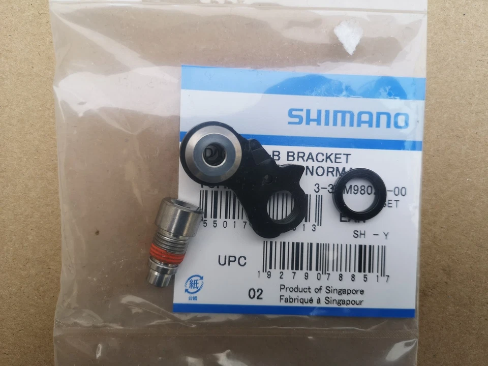 Shimano Achseinheit + Schaltwerkhalter Deore RD-M5120 10/11-fach - Bild 1 von 1