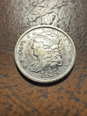 MEDIA MONEDA DE DIEZ CENTAVOS BUSTO TAPADO 1834 - ¡Escasa fecha temprana tonificada! Foto 1 de 4