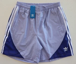 PANTALONES CORTOS TEJIDOS LIGEROS ADIDAS ORIGINALES VERANO SST HOMBRE - PÚRPURA POLVO HC2099 M - Imagen 1 de 12