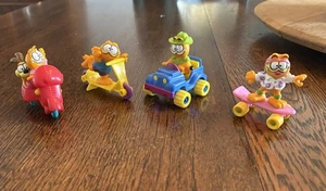 Vintage McDonalds GARFIELD Happy Meal Toys 1988 Set of 4 Odie Jeep Board Scooter - Picture 1 of 5