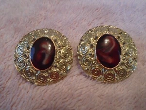 Vintage Gold Tone Clip-on Earrings with a Maroon Gem Stones - Picture 1 of 5