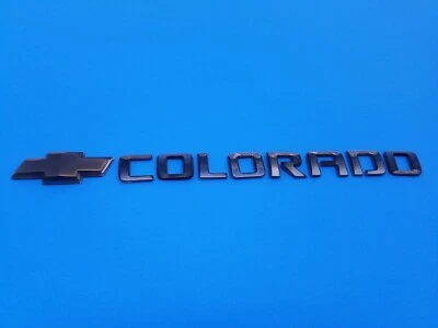 04 05 06 07 08 09 10 11 12 CHEVROLET COLORADO EMBLEMA TRASERO LOGOTIPO INSIGNIA OEM (2012) Foto 1 de 4