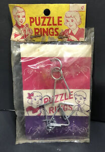 Vtg 1950/60 Toy Puzzle Rings Japan NOS  Gift Magic Trick - Pkg Dirty -Free Ship