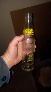 Vtg TAB Yellow A Coke Cola Product 10 Oz. & Starburst Embossing Design Bottle - Picture 1 of 4