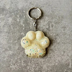 Portachiavi zampetta color crema con glitter fiocco di neve - Foto 1 di 4