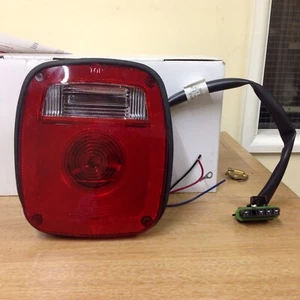 SIGNAL STAT STOP TAIL & REVERSE LAMP 5014K - Picture 1 of 1