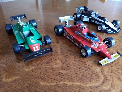 Tris auto modelli da corsa Burago  scala 1:24 Ferrari, Alfa Romeo, Brabham - Immagine 1 di 4