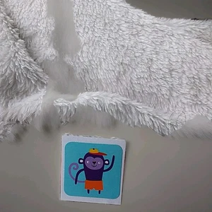 Purple Monkey Wearing A Hat And Orange Shorts Sticker - Picture 1 of 5
