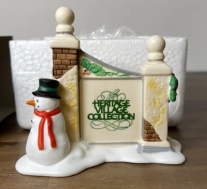 Department 56 #5572-7 Heritage Village Collection - Village Sign with Snowman - Picture 1 of 6
