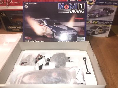 Action Whit Bazemore Mobil One 1995 Dodge  Funny Car 1:24 never opened - Image 1 of 4