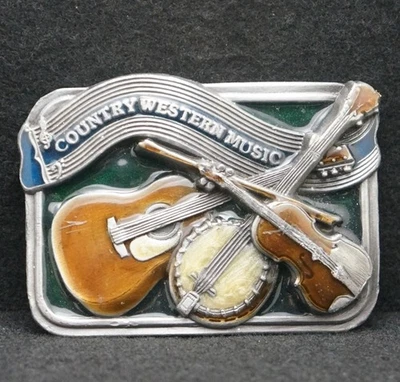 WF13130 VINTAGE 1984 ***MÚSICA COUNTRY WESTERN*** INSTRUMENTOS ILUSTRACIONES HEBILLA DE CINTURÓN Foto 1 de 2