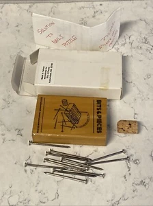 Bits & Pieces Wooden Puzzle - Can You Balance 10 Nails on Top of 1 Nail? - Picture 1 of 6