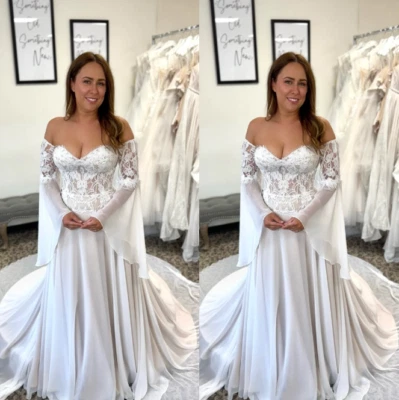 Vestido de novia de satén con hombros descubiertos manga larga tren de barrido línea A vestidos de novia Foto 1 de 4