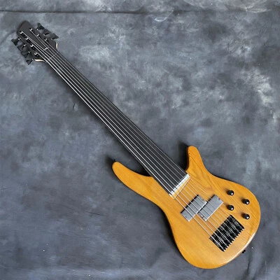 Bajo eléctrico de 7 cuerdas sin trastes cuerpo de ceniza cuerpo sólido diapasón de palisandro Foto 1 de 4