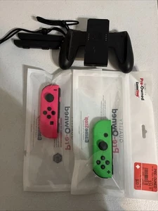 Nintendo Switch OLED Joycon Zubehörset Neon Pink und Neon Grün - Bild 1 von 1