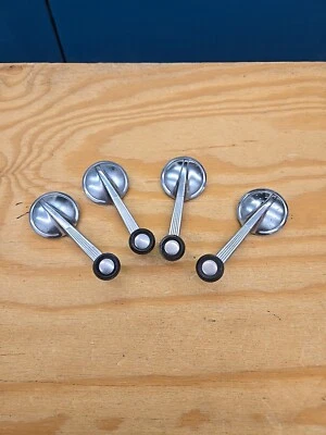 Four 1955-64 Chevrolet Black Knob With Chrome Insert Window Cranks - Image 1 of 3