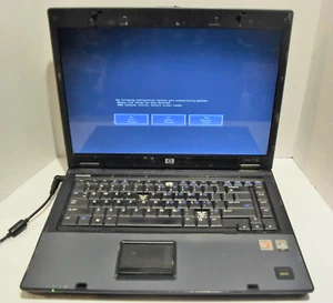 HP Compaq 6715b 15.4in. (AMD Turion 64 X2, 1.8GHz, 1GB) Notebook/Laptop - BROKEN - Picture 1 of 9