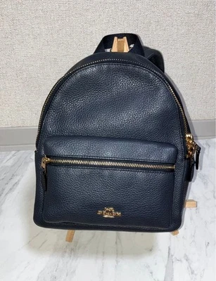 Mini mochila bandolera compacta Coach azul marino herrajes dorados incluidos de importación Foto 1 de 4