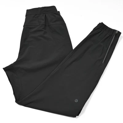 Pantalones de chándal Lululemon Surge para hombre pequeños grises reflectantes rendimiento elásticos usados en excelente estado Foto 1 de 4