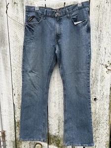 Pantalones de mezclilla Ariat M4 corte bota relajado para hombre 36x32 bolsillos lavados oscuros - Imagen 1 de 7