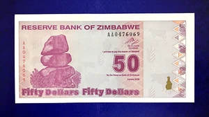 2009 ZIMBABWE - 50 DOLLARS - GEM UNC - EZAF - Picture 1 of 2