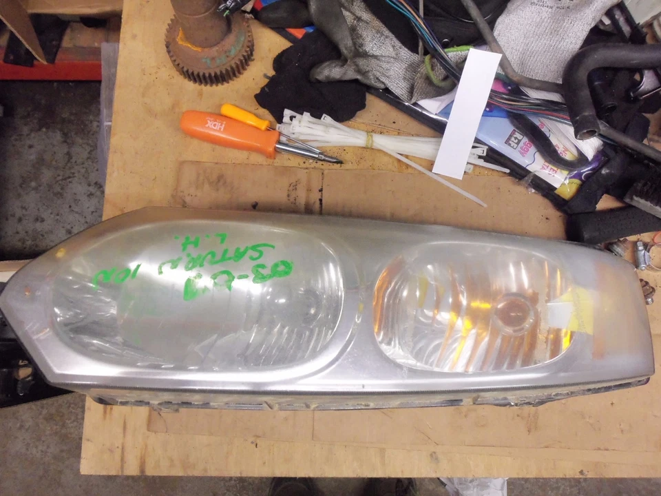 Faro delantero izquierdo Saturn Ion 2003-2007 22730913 Foto 1 de 4