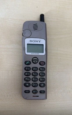 Téléphone portable Sony CMD-CD5 argent, testé, revendeur, garantie, pleine fonction - Photo 1/2