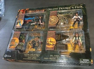 DISNEY PIRATES OF THE CARIBBEAN DELUXE FIGUREN 4 STÜCK - Bild 1 von 2
