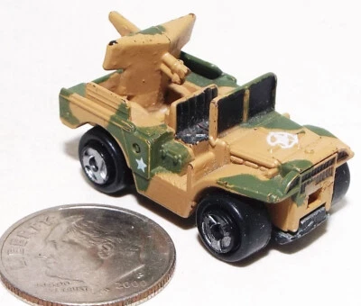 Small Micro Machine WWII type M-37 Weapons Carrier in Green/Tan Camouflage - Image 1 of 4