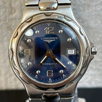 Reloj de cuarzo suizo para hombre Longines Conquest L1.631.4 esfera azul 7,5" SS Foto 1 de 4
