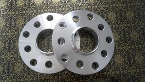 Two WHEEL HUBCENTRIC SPACERS 5X100MM / 5X112MM | 12MM THICK | 57.1MM CB - Picture 1 of 1