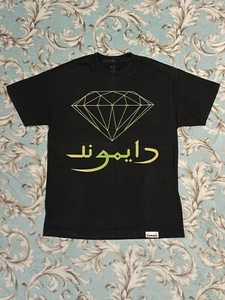 CAMISETA ÁRABE VINTAGE DIAMOND SUPPLY CO (GRANDE) (NEGRA) IRON MAIDEN CASSIE WIZ - Imagen 1 de 12