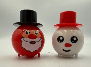 Red Figure With Black Hat and Snowman With Red Hat Wind Up Toys 2 Inches - Picture 1 of 3