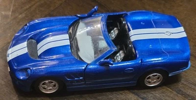 5¼" SHELBY 1/32 New Ray 2000 SHELBY Serie 1 Convertible Blue w White Stripes Car - Image 1 of 4