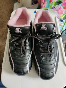 Womens size 6 gently used black and pink starter cleats.
