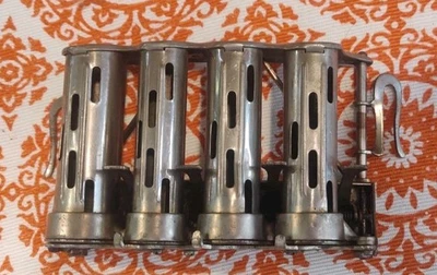 Cambiador de monedas McGill vintage gancho de cinturón de 4 barriles dispensador de monedas de metal  Foto 1 de 4