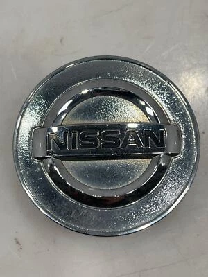 Tapa central de llanta de aleación Nissan para Juke Versa Rogue Sentra Quest OEM 40343AU51A Foto 1 de 2
