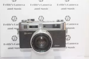 Yashica Electro 35 GS 35mm Telecamera Telemetro Pellicola per Ricambi Riparazione o Display - Foto 1 di 24