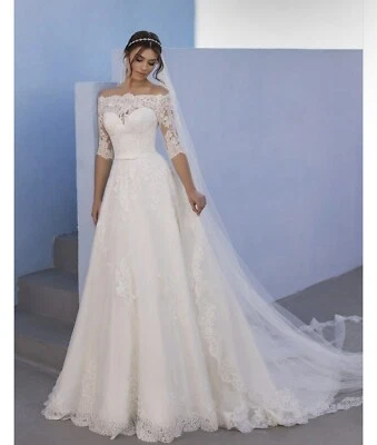 Offwhite OSSA Talla 28 Transparente Encaje Fuera del Hombro Vestido de Boda Mangas Vestido de Baile Foto 1 de 4