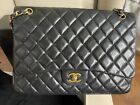 Chanel black quilted lambskin  25k Plated gold hardware